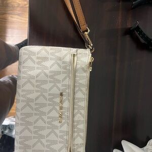 Selling MK wristlet